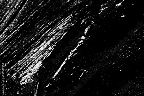 Black and white grunge texture. Black streaks of paint, ink, and dirt. Abstract monochrome background. Pattern of scratches, chips, and wear © VYACHESLAV KRAVTSOV