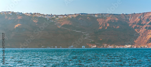 A view towards the island of Thirasia, Santorini in summertime