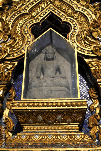 The Buddha image at Tympanum of the Pagoda of Wat Thammamongkol temple in Bangkok Thailand