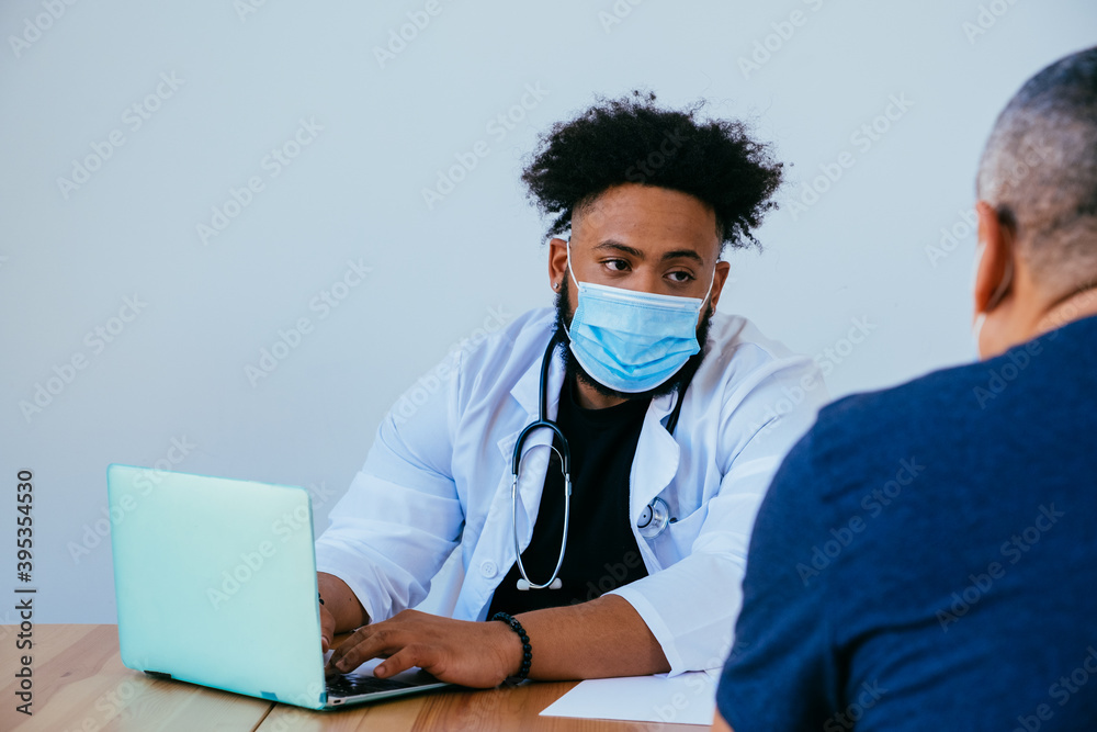 Portrait of doctor and patient with face masks during medical exam and consultation, Portrait of doctor and patient with face masks during medical exam and consultation,