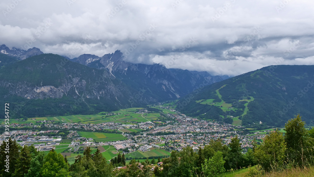 Beautiful panorama view of town Lienz, Tyrol, Austria, a popular tourist destination, located in valley at rivers Isel and Drau with snow-capped mountains of the rugged Gailtal Alps (Lienz dolomites).