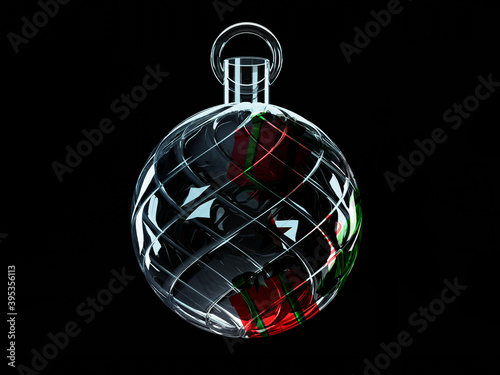 Christmas decoration ball clear glass texture on a dark background with red gift box inside