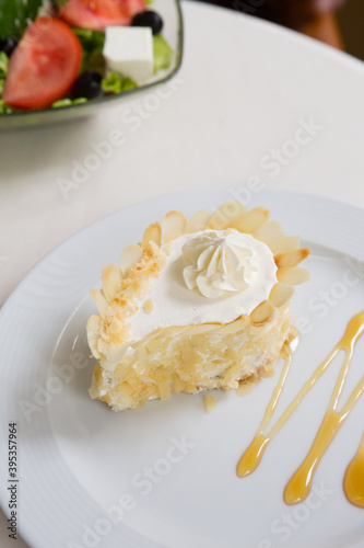 Almond cream cake on a plate