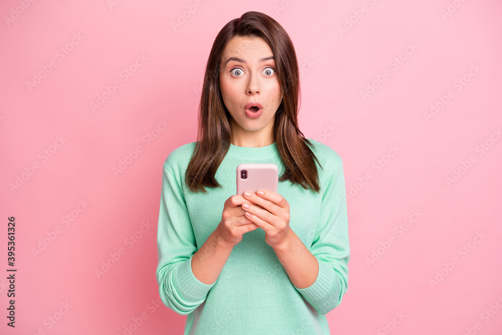 Portrait of speechless attractive person fear stare open mouth teal pullover isolated on pink color background Portrait of speechless attractive person fear stare open mouth teal pullover isolated on pink color background