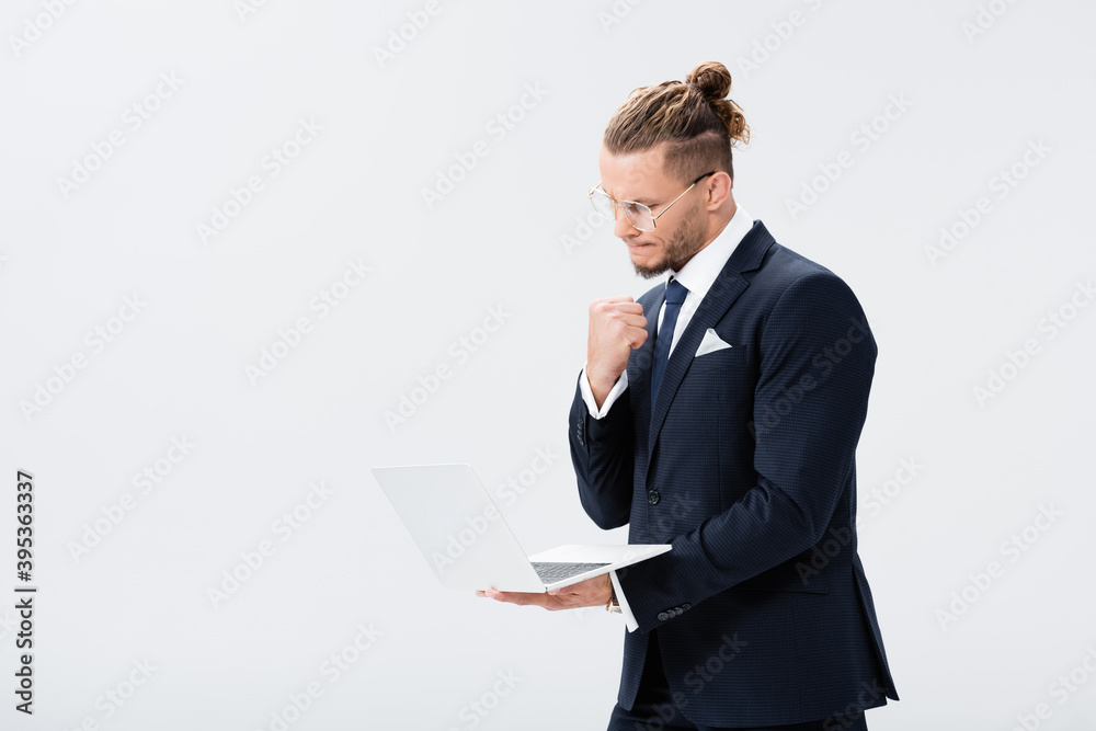 businessman in suit and glasses with laptop isolated on white businessman in suit and glasses with laptop isolated on white