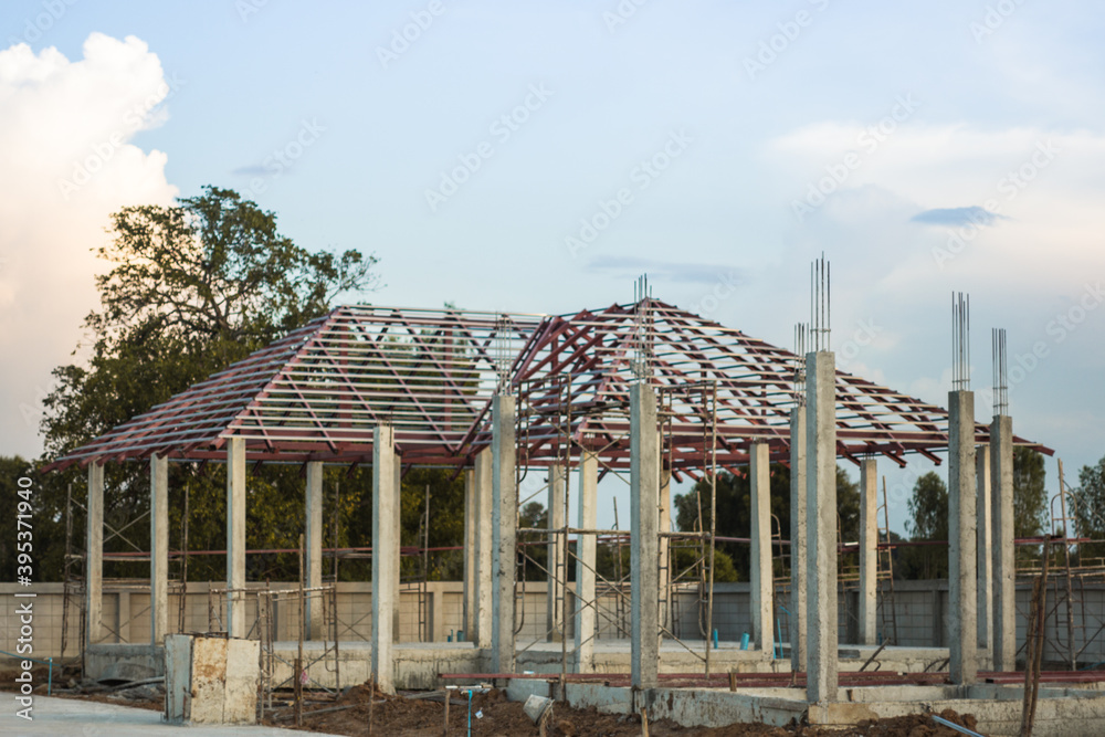 structure of the building. The new house is under construction.