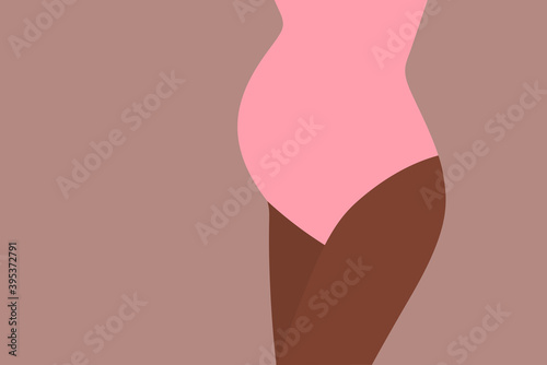 Close-up of pregnant black woman's belly in bodysuit