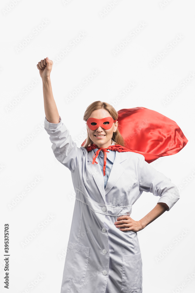 nurse in superhero mask and cloak standing with raised hand isolated on white nurse in superhero mask and cloak standing with raised hand isolated on white