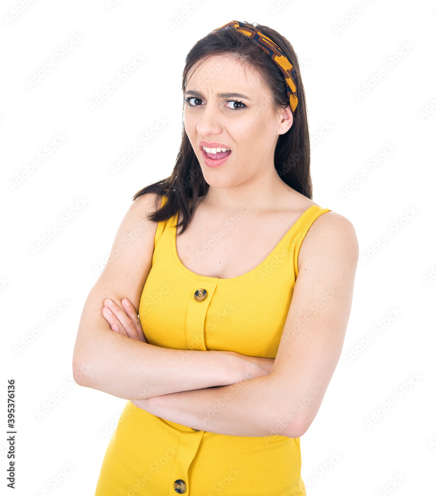 Doubtful and dissatisfied young woman holding her arms crossed, isolated on white background. Angry and annnoyed face, having skeptical and suspicious look, expressing suspicion or doubt Doubtful and dissatisfied young woman holding her arms crossed, isolated on white background. Angry and annnoyed face, having skeptical and suspicious look, expressing suspicion or doubt