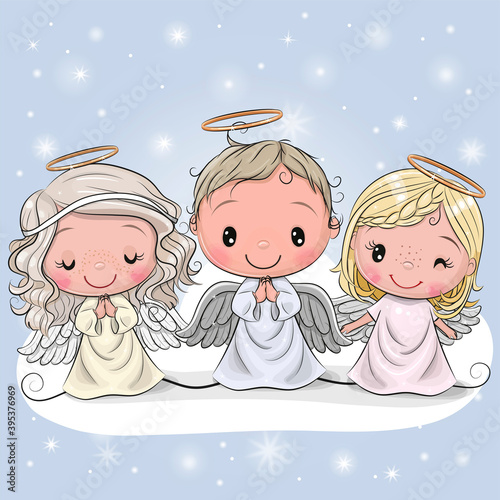 Three Christmas angels on a blue background