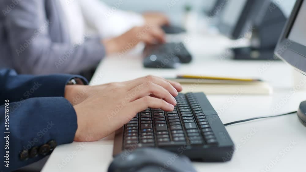 Closeup business people hands typing on keyboard computer desktop for using internet, searching data, working, writing email.