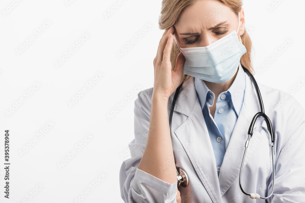 tired nurse in mask having headache isolated on white tired nurse in mask having headache isolated on white