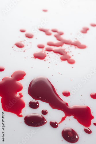 drops of blood, on a white background. view from above