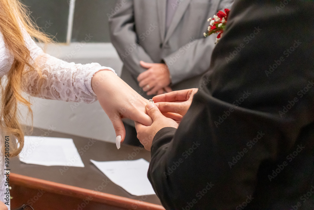 Holding hands with wedding ring Holding hands with wedding ring