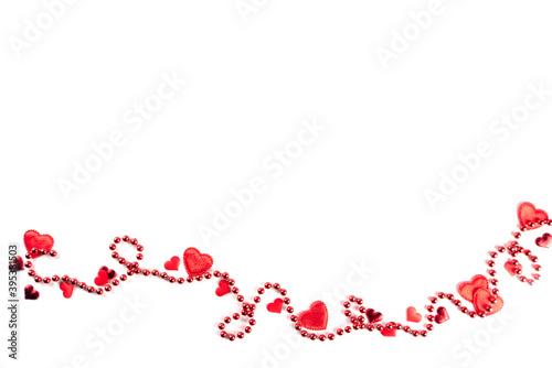 Saint Valentine's day greeting card, border of holiday symbols, on white background. Various red hearts and red beads, above