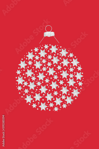 Silver star abstract round Christmas bauble on red background. Xmas design concept for the festive holiday season. Copy space.