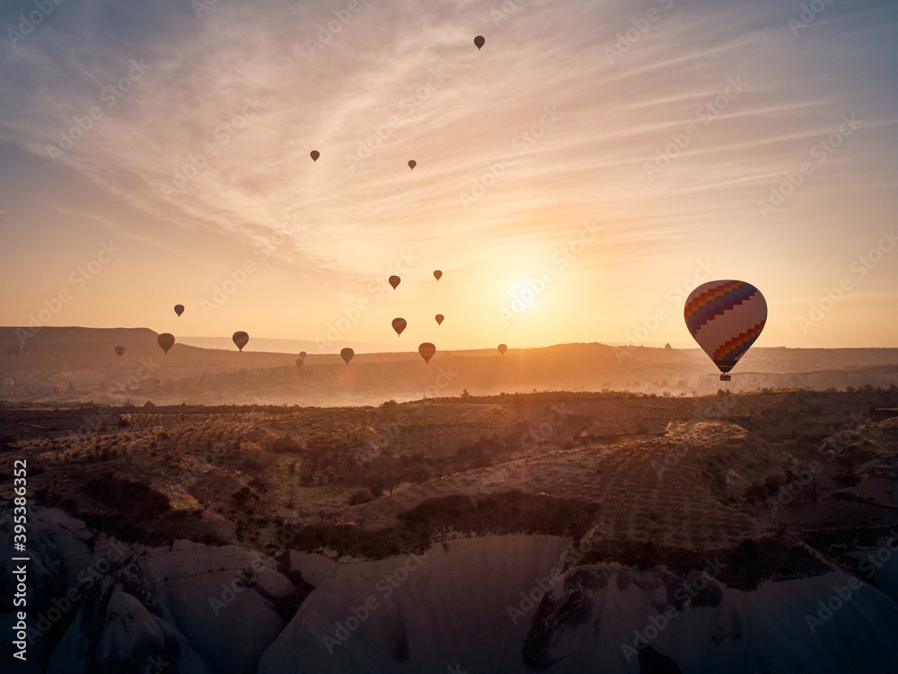 Hot air balloon in Cappadocia on the sunrise.