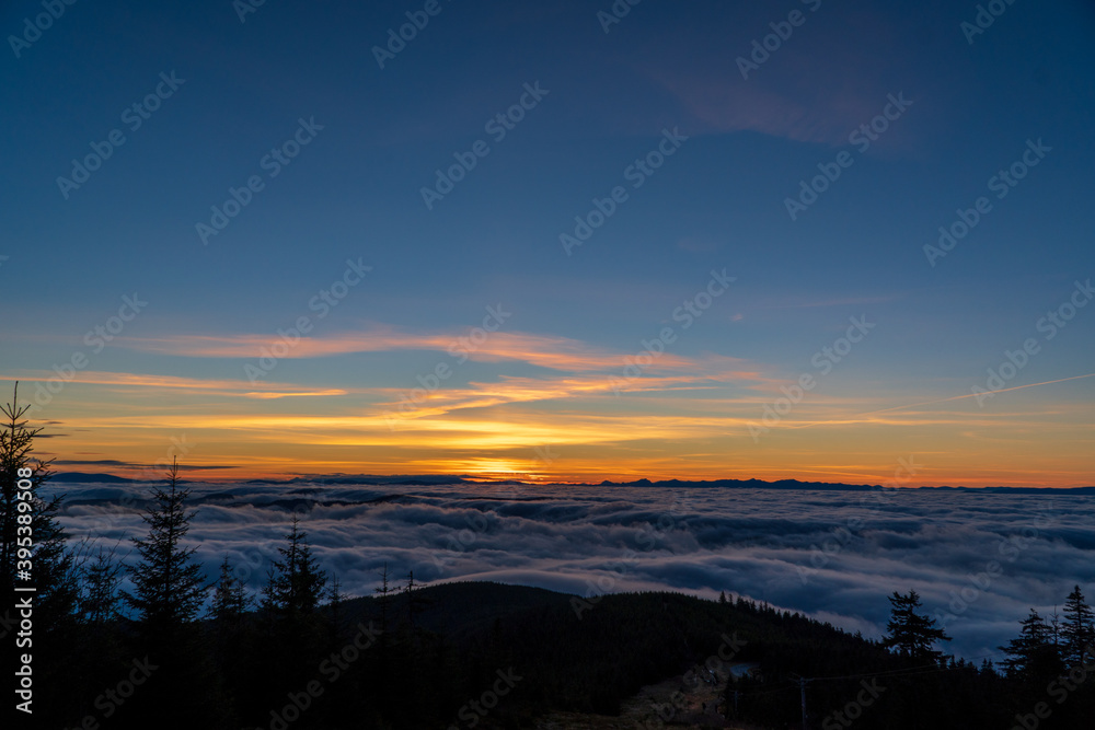Early dawn. The rising of the sun above the clouds. Expectation of the sun. Beskydy , Czech Republic.