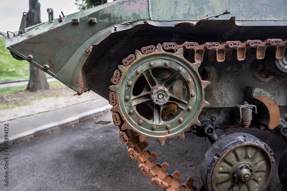 rusty caterpillar of a military machine