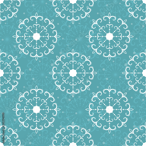 Hand drawn beautiful seamless pattern of openwork snowflakes. Happy New Year and Christmas decorative vector illustration for greeting card  invitation  wallpaper  wrapping paper  fabric