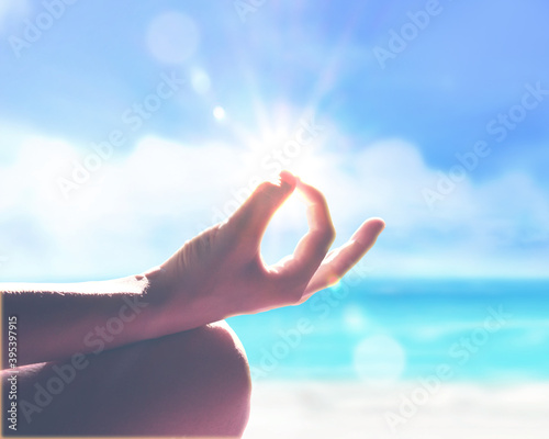 Yoga, meditation and healthy lifestyle. Sunset on the beach.