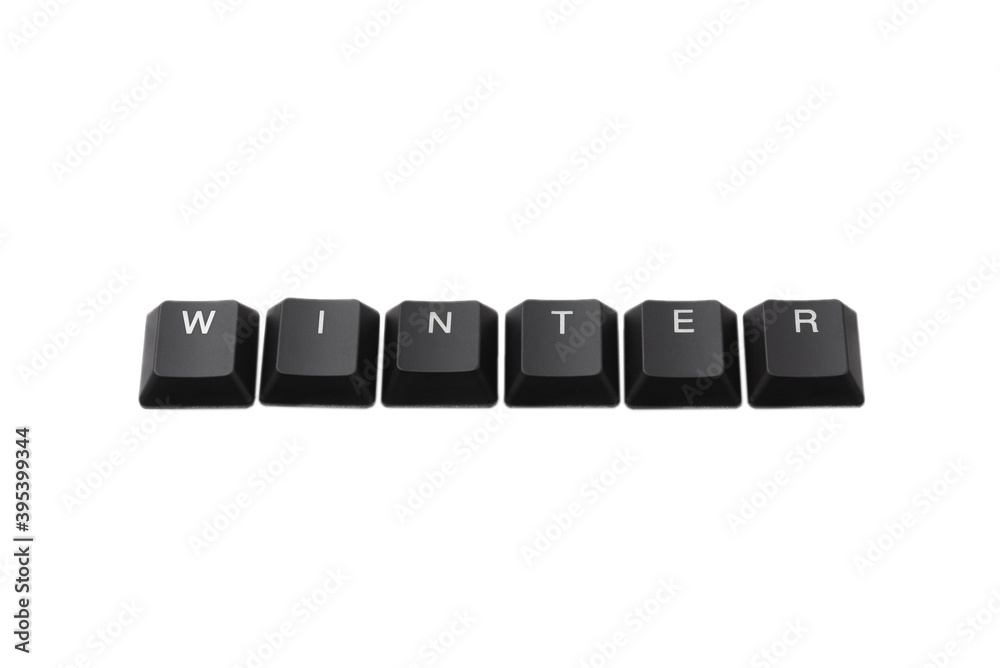 Word winter written on keyboard. Isolated on white. Word winter written on keyboard. Isolated on white.