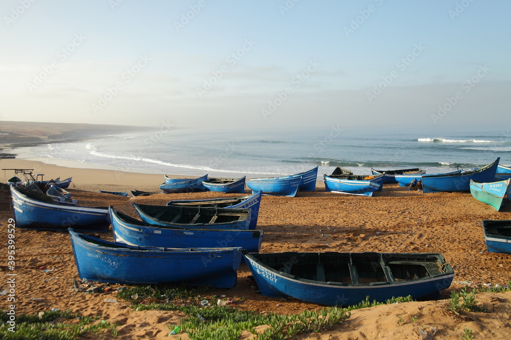 abandoned boats near the ocean in Morrocco