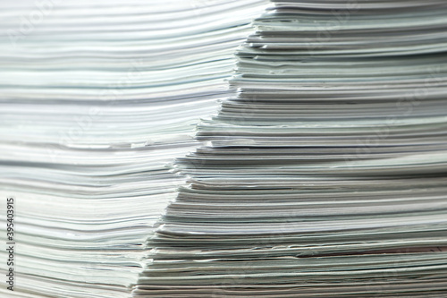 bundles bales of paper documents. stacks packs pile on the desk in the office © Artem