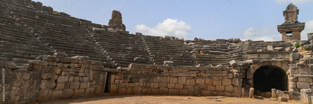 Ruins of ancient theater in Xanthos town, old roman civilization in Turkey. Wide banner Ruins of ancient theater in Xanthos town, old roman civilization in Turkey. Wide banner