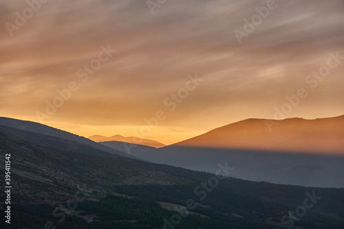 Sunset over Pico de Peñalara and the Lozoya Valley from Puerto de la Morcuera in the Sierra de Guadarrama National Park. Madrid's community. Spain