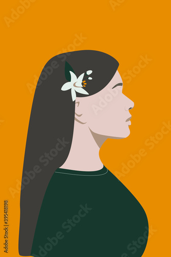 Elegant girl in profile with a flower of a fruit tree in her hair. Great poster, postcard or element for your design.
