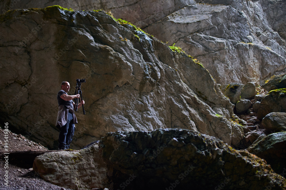Pro shooter working in a cave