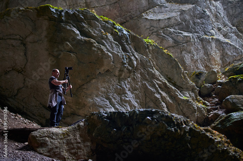 Pro shooter working in a cave