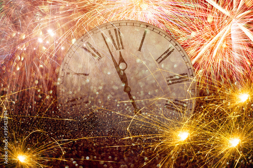 Fireworks New Year Clock.Countdown New Year's clock.Clock that marks a few minutes to the new year with torches and fireworks.