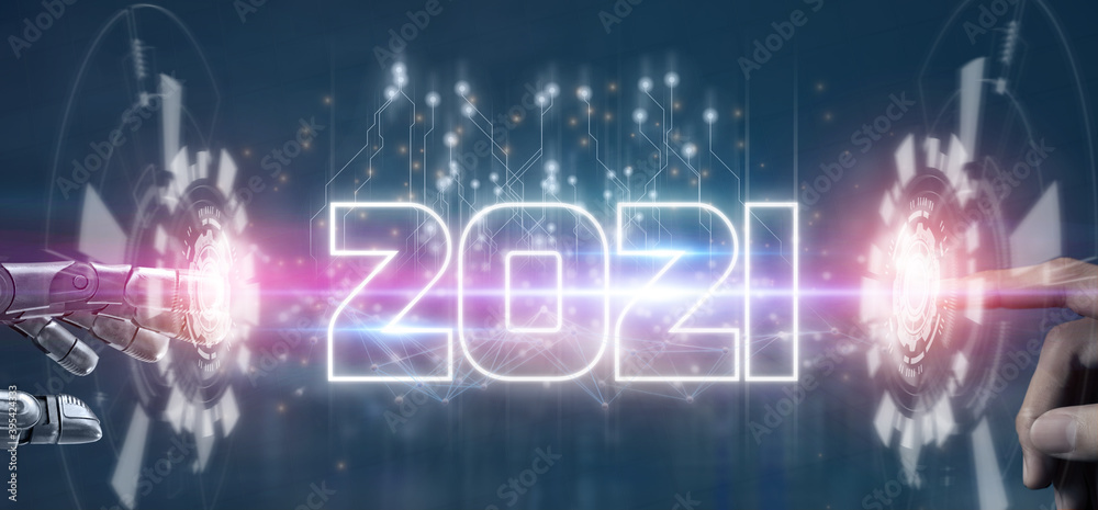2021 futuristic tehcnology trend concept,  hand man and robot hand pointing together in concept futuristic in 2021 coming year the year of artificial intelligence ,big data, iot, augmented reality