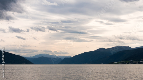 Wallpaper Mural View on a Fjord in Norway, northern Europe, during a cruise north of the city of Bergen. Colorful skies, mountains on the sides. Photographed in summer.  Torontodigital.ca