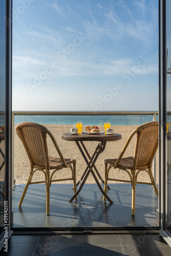 table and chairs on the beach