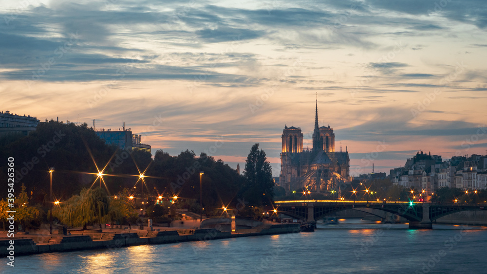 View of Notre-Dame Cathedral and the Seine, before sunset, in Paris, France. Photographed before the fire of the cathedral. 