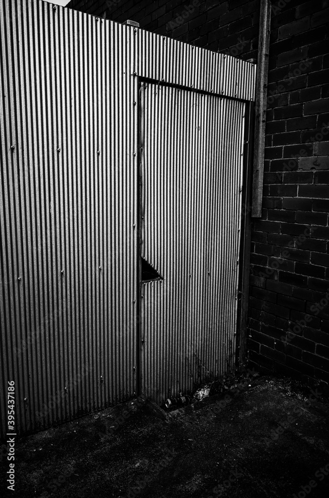 old steel door in the wall old steel door in the wall