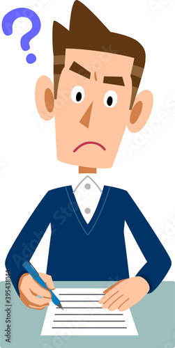 疑問を持った表情で書類に記入する男性
