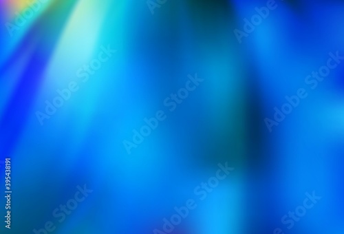 Light BLUE vector blurred pattern.