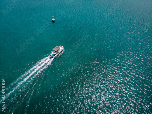 speed Boat/ yacht at sea leaving a wake, aerial view