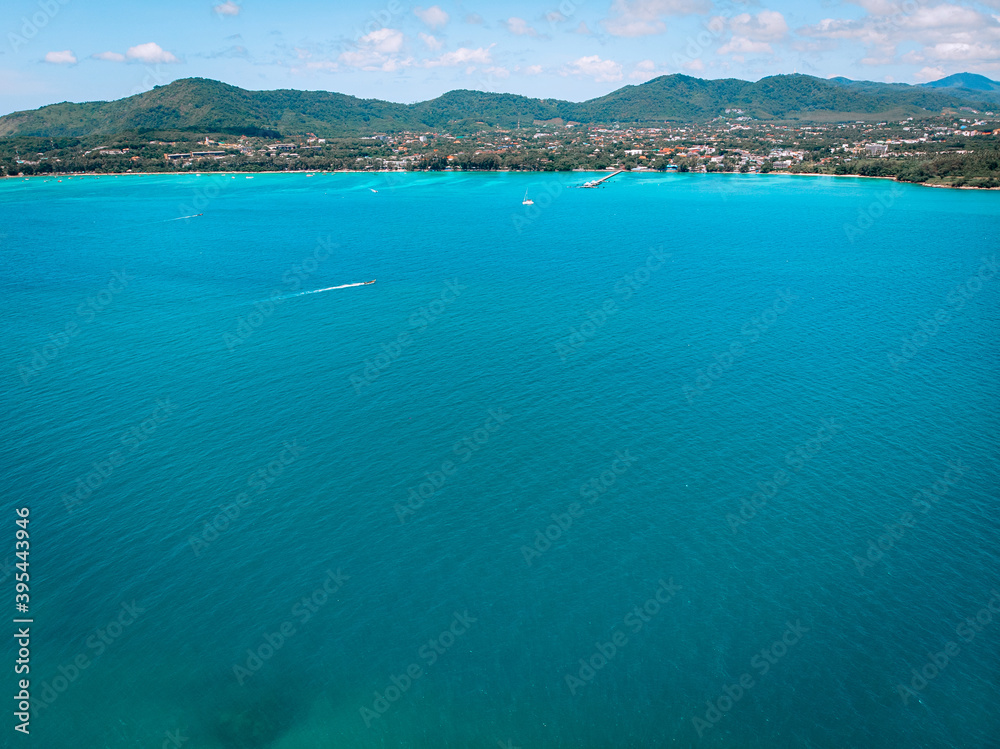 Top view aerial photo from flying drone of an amazing seascape with paradise beach and sea with turquoise water. Summer vacation holidays in Thailand. Perfect website background with copy space area Top view aerial photo from flying drone of an amazing seascape with paradise beach and sea with turquoise water. Summer vacation holidays in Thailand. Perfect website background with copy space area