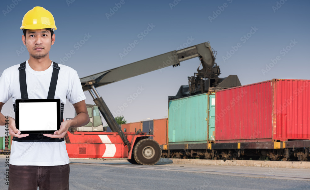 Foreman stand show tablet on front forklift loading Containers box to Logistic cargo Import Export Foreman stand show tablet on front forklift loading Containers box to Logistic cargo Import Export