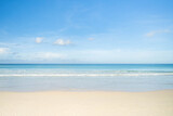 Beautiful beach in Phuket against tiny clouds sky background.