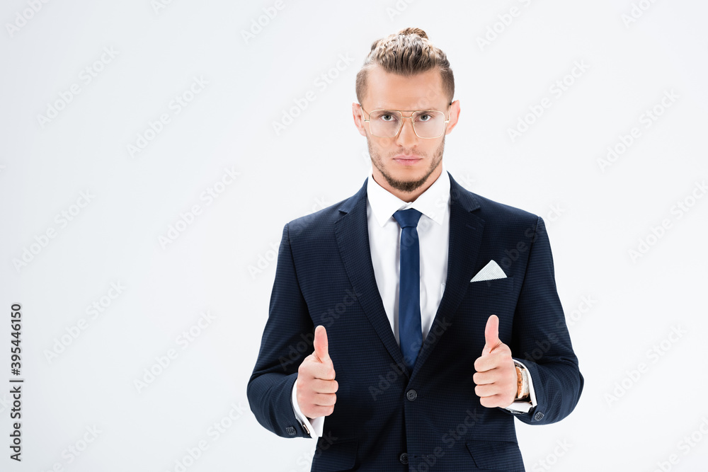 businessman in suit and glasses showing thumbs up isolated on white businessman in suit and glasses showing thumbs up isolated on white