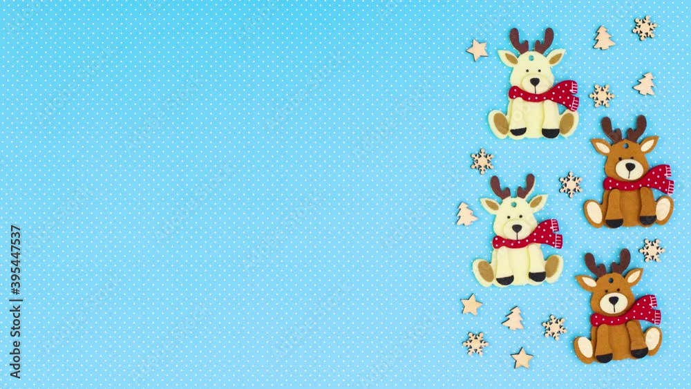 Christmas reindeers move on right side of blue theme. Stop motion Christmas reindeers move on right side of blue theme. Stop motion