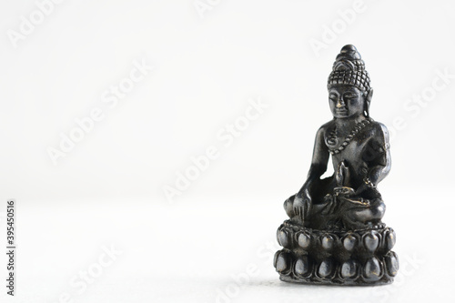 Closeup Thai amulet isolated on white background.