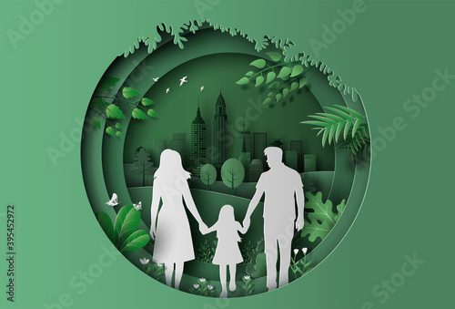 A family enjoys fresh air in the park holding hands together, save the planet and energy concept, paper art, and craft style.