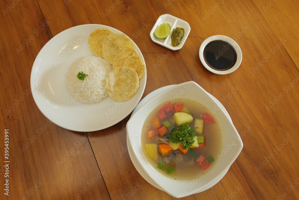 Beef oxtail soup with emping crackers Beef oxtail soup with emping crackers